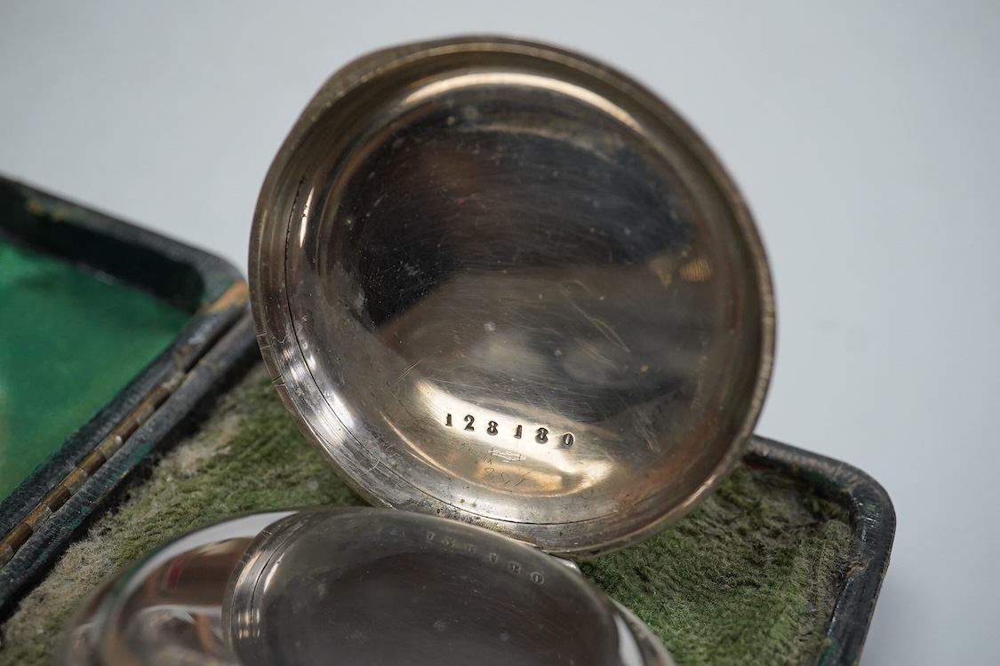 An Edwardian silver and pique inlaid tortoiseshell pocket watch case, Henry Clifford Davis, Birmingham 1909, 11.3cm, containing keyless pocket watch.